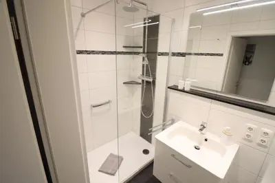 Ein Badezimmer in der Unterkunft Appartementhaus Kogge Wohnung 10