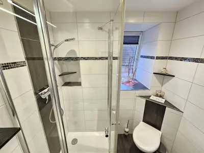 Ein Badezimmer in der Unterkunft Appartementhaus Kogge Wohnung 11