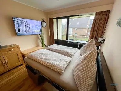 TV/Unterhaltungsangebot in der Unterkunft Whg. 121 Haus Jan am Strand
