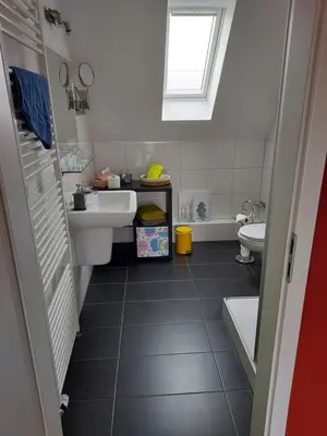 Ein Badezimmer in der Unterkunft Schlummerkasten