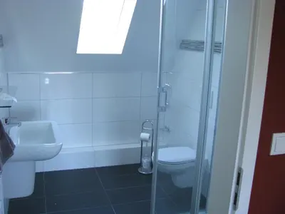 Ein Badezimmer in der Unterkunft Schlummerkasten