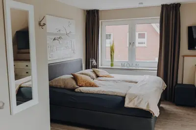 Ein Bett oder Betten in einem Zimmer der Unterkunft Lagune No1