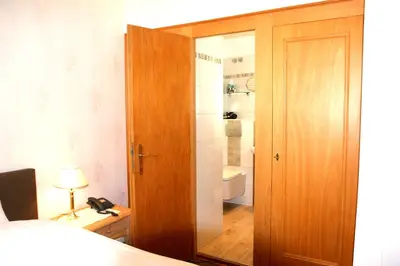 Ein Bett oder Betten in einem Zimmer der Unterkunft Hotel Beckröge
