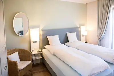 Ein Bett oder Betten in einem Zimmer der Unterkunft Haus Isabel