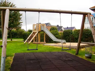 Ein Kinderspielbereich in der Unterkunft Rotesand