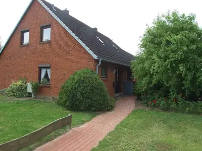 Ein Garten an der Unterkunft Doppelhaushälfte Thormählen/Wulf