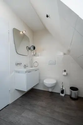 Ein Badezimmer in der Unterkunft Hotel Luina Beach