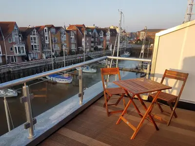 Ein Balkon oder eine Terrasse in der Unterkunft Ferienhaus Hafenzeit