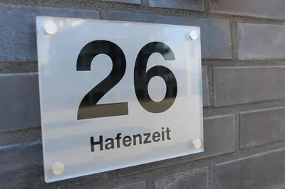 Ein Zertifikat, Auszeichnung, Logo oder anderes Dokument, das in der Unterkunft Ferienhaus Hafenzeit ausgestellt ist