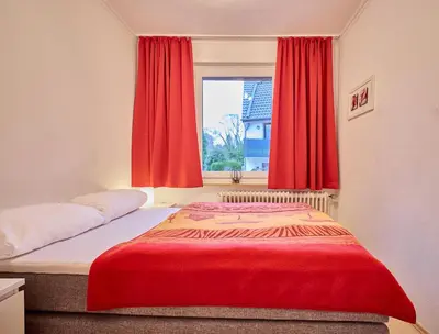 Ein Bett oder Betten in einem Zimmer der Unterkunft Haus Nicole