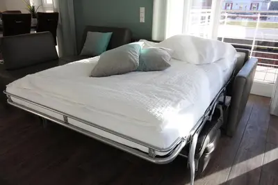 Ein Bett oder Betten in einem Zimmer der Unterkunft Wohnen am Yachthafen W25