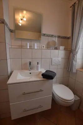 Ein Badezimmer in der Unterkunft Ferienwohnung Haus Möwe