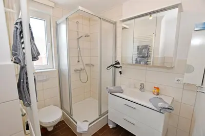 Ein Badezimmer in der Unterkunft Ferienwohnung NORDIA Allee und See