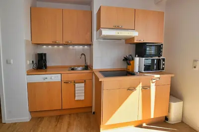 Küche/Küchenzeile in der Unterkunft Ferienwohnung NORDIA Allee und See