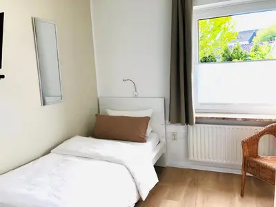 Ein Bett oder Betten in einem Zimmer der Unterkunft Pension Maren