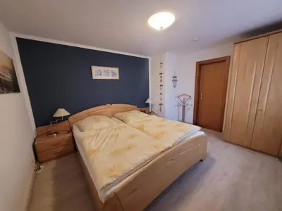 Ein Bett oder Betten in einem Zimmer der Unterkunft Gästehaus Bei J.A.G.