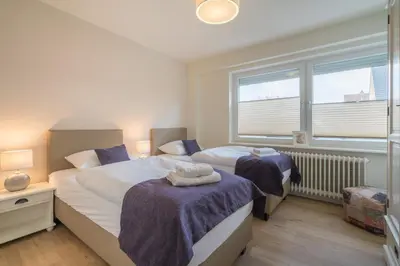 Ein Bett oder Betten in einem Zimmer der Unterkunft Diekhuus Büsum