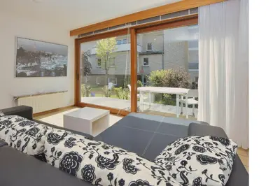 Ein Bett oder Betten in einem Zimmer der Unterkunft Stranddomicil Steiner - Gästehäuser