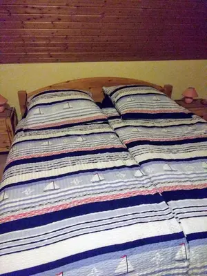 Ein Bett oder Betten in einem Zimmer der Unterkunft Apartment Scharhörn