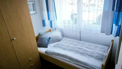 Ein Bett oder Betten in einem Zimmer der Unterkunft Frische Brise 01.09