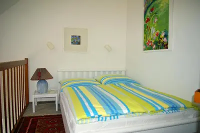 Ein Bett oder Betten in einem Zimmer der Unterkunft Ferienwohnung Meisennest