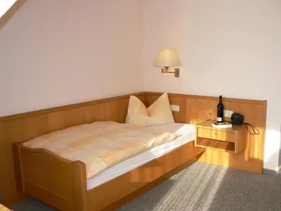 Ein Bett oder Betten in einem Zimmer der Unterkunft Landhaus Braband