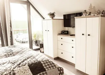 Ein Bett oder Betten in einem Zimmer der Unterkunft Perlekieker 2