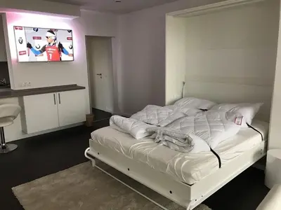Ein Bett oder Betten in einem Zimmer der Unterkunft Ferienwohnung Schöne Aussicht