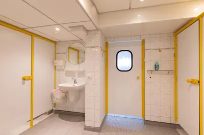 Ein Badezimmer in der Unterkunft Knechtsand 414