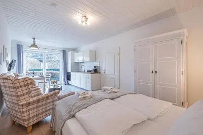 Ein Bett oder Betten in einem Zimmer der Unterkunft Seehof Boutique Appartements