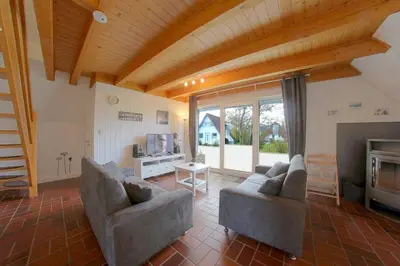 Ein Sitzbereich in der Unterkunft Ferienhaus Vogel - Dorum Neufeld - Nordsee
