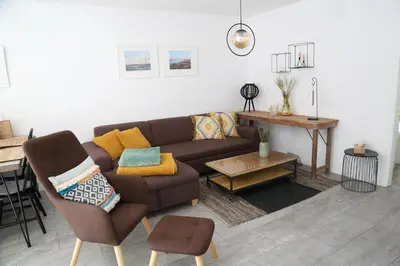 Ein Sitzbereich in der Unterkunft Ferienwohnung Stöckel
