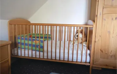 Ein Bett oder Betten in einem Zimmer der Unterkunft Beautiful Home In Wurster Nordseeküste