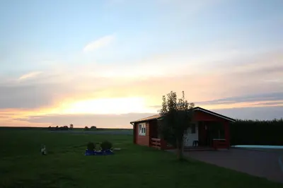 Blick auf den Sonnenuntergang/Sonnenaufgang von der Ferienwohnung aus oder aus der Nähe