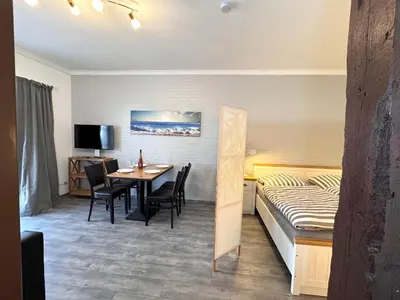 Ein Bett oder Betten in einem Zimmer der Unterkunft Landhaus Nordsee-Peerhuus