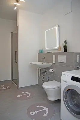 Ein Badezimmer in der Unterkunft Haus Yachthafen 4
