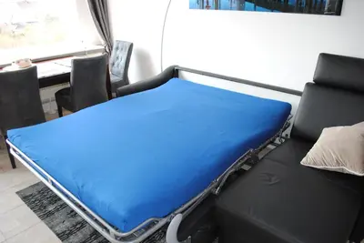 Ein Bett oder Betten in einem Zimmer der Unterkunft Terrassenhaus Penthouse-Wohnung 93