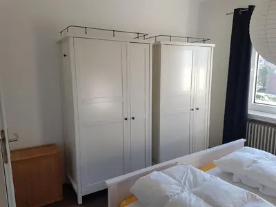 Ein Bett oder Betten in einem Zimmer der Unterkunft Ferienhaus Lemafri Duhnen