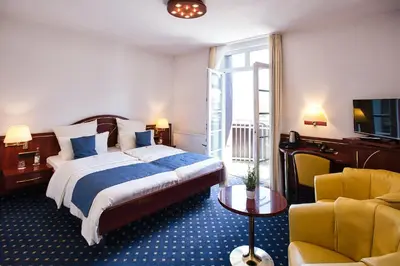 Ein Bett oder Betten in einem Zimmer der Unterkunft Hotel Meeresruh Garni