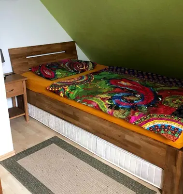 Ein Bett oder Betten in einem Zimmer der Unterkunft Ferienhaus Sören