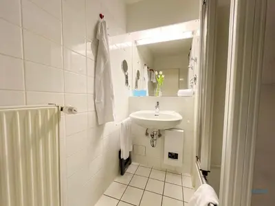 Ein Badezimmer in der Unterkunft Urlaub mit Blick auf den Duhner Strand