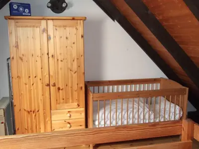 Ein Bett oder Betten in einem Zimmer der Unterkunft Ferienwohnung Baade -KEINE MONTEURE-
