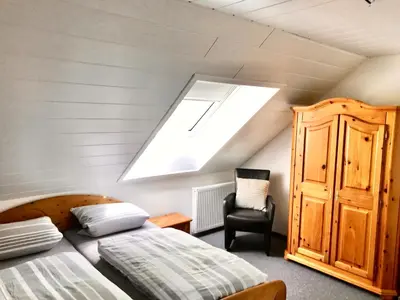 Ein Bett oder Betten in einem Zimmer der Unterkunft Ferienwohnung Butendiek