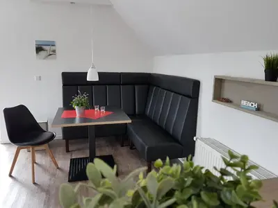 Ein Sitzbereich in der Unterkunft dat geele hus 1