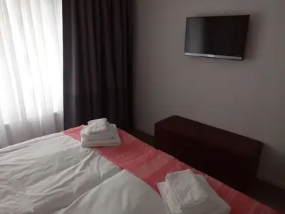 Ein Bett oder Betten in einem Zimmer der Unterkunft dat geele hus Wohnung 6