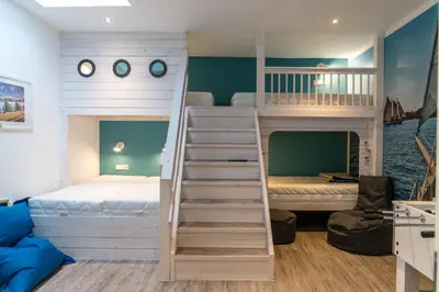 Ein Bett oder Betten in einem Zimmer der Unterkunft Beachhouse