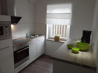 Küche/Küchenzeile in der Unterkunft dat geele hus Wohnung Nr. 4