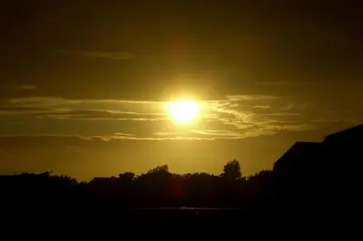 Blick auf den Sonnenuntergang/Sonnenaufgang von der Ferienwohnung aus oder aus der Nähe