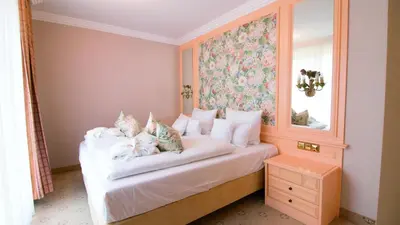 Ein Bett oder Betten in einem Zimmer der Unterkunft Seeschlößchen - Hotel Strandperle