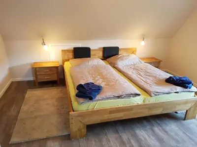 Ein Bett oder Betten in einem Zimmer der Unterkunft Haus Weimann